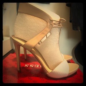 T-strap tie heels by GUESS